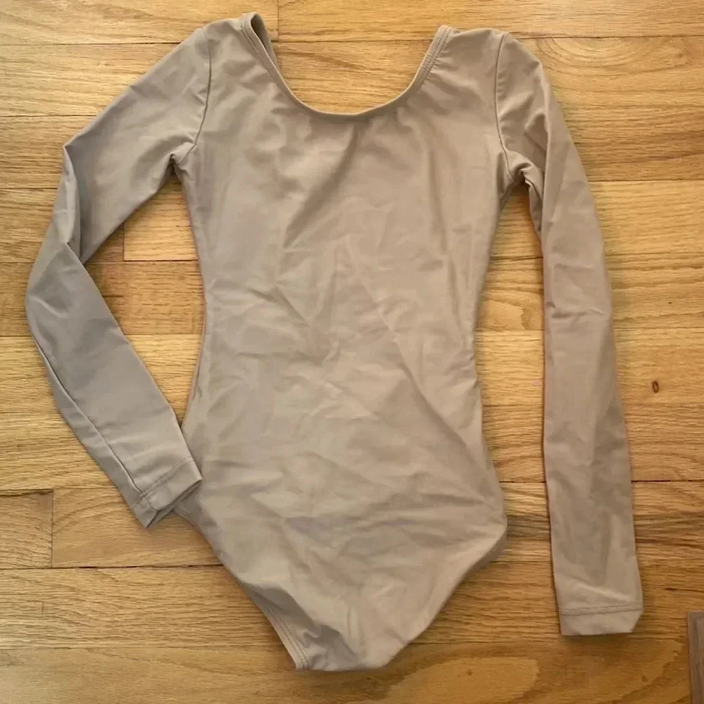 Theatricals long sleeve nude leotard hood pre owned condition no pilling sz IC